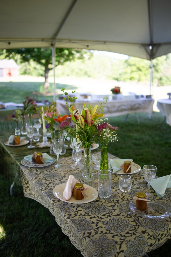 a table set with vintage items at a wedding