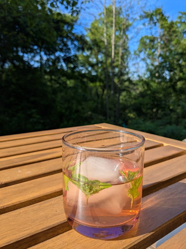 pink clear glass on a wood table