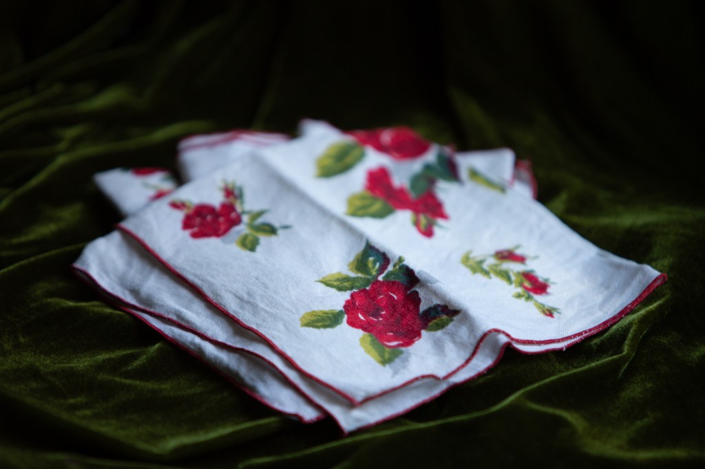 napkins folded on a velvet table cloth